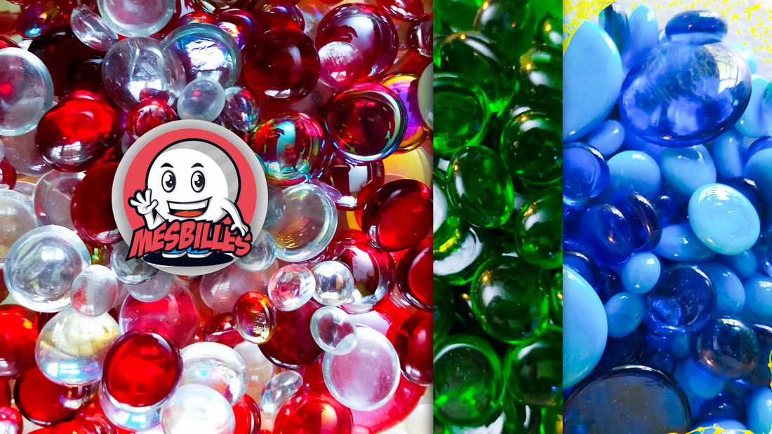 Foto di ordini di biglie piatte di vari colori, a forma di goccia, stella o disco.
