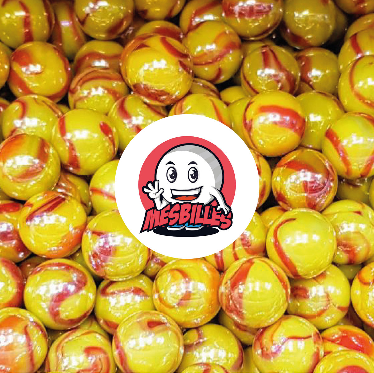 Immagine della mascotte MesBilles circondata da biglie Drago 35 mm - Incredibile combinazione di giallo e rosso in un vetro opaco e brillante