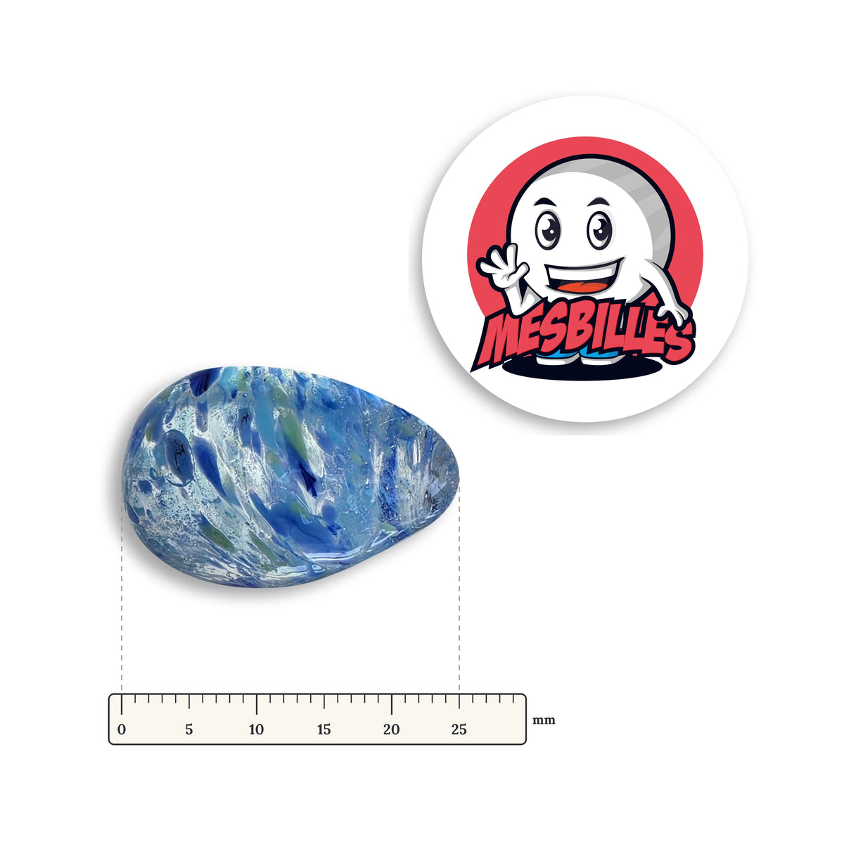 Bille Oeuf Cristal Moucheté Bleu couchée à côté d'une règle graduée, environ 25 mm de long